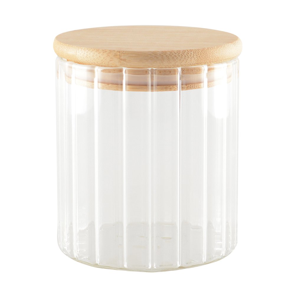 Clear glass jar with a wooden lid on a white background cosy vibes